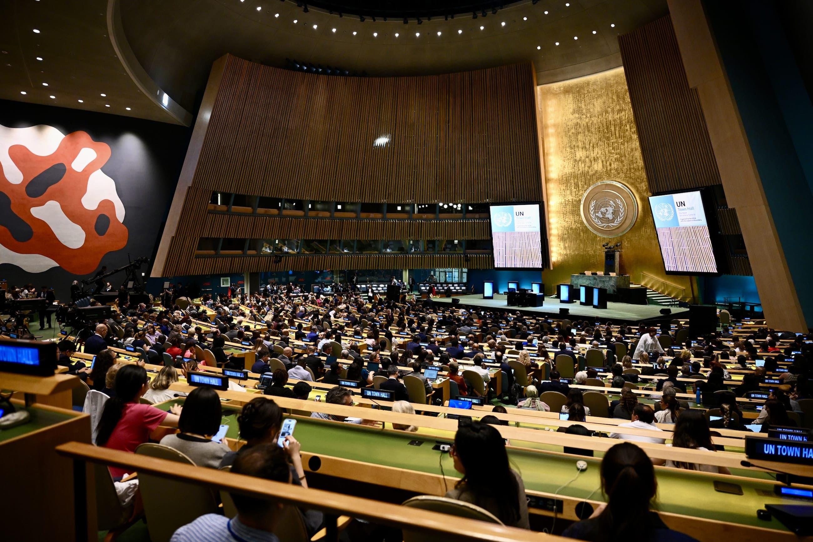 Delegates fill the General Assembly Hall during a United Nations town hall.