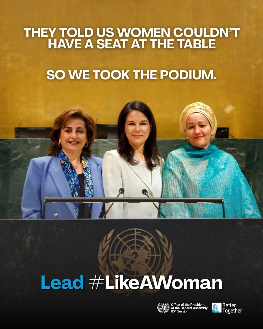 Director-General Tatiana Valovaya, General Assembly President Annalena Baerbock and Deputy Secretary-General Amina J. Mohammed stand at the United Nations podium beneath the words, “They told us women couldn’t have a seat at the table, so we took the podium.”